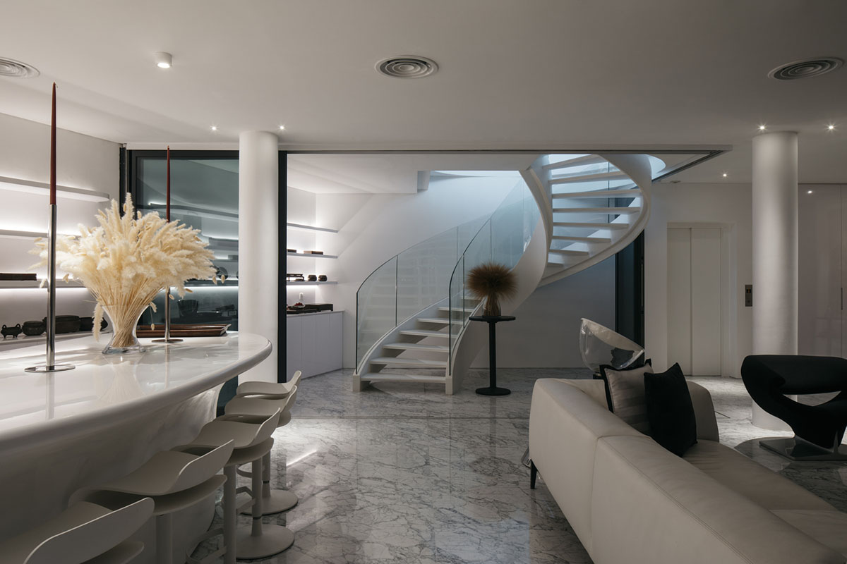 EHKA Studio's curvaceous residence features floating pods offering playful facade in Singapore