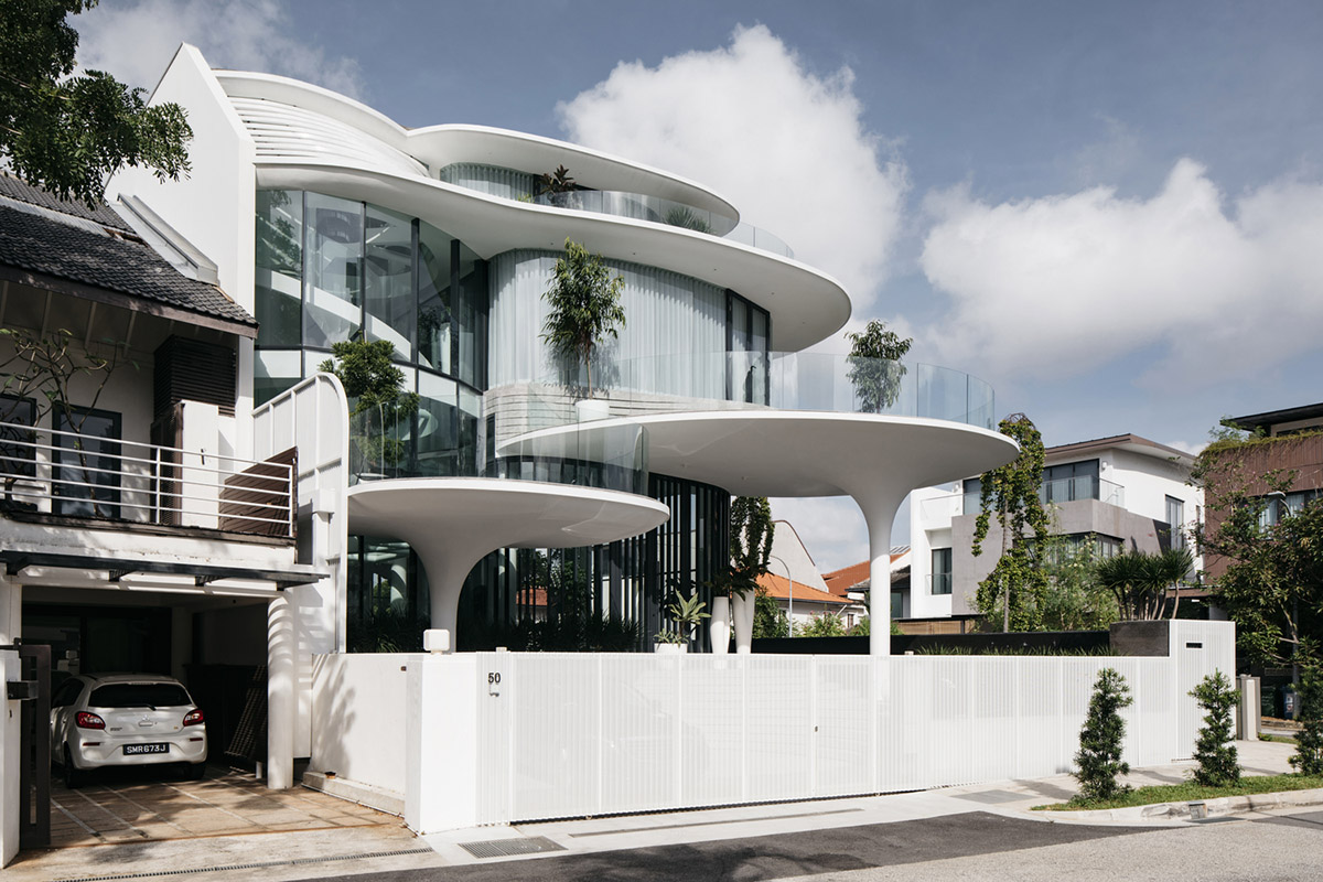 EHKA Studio's curvaceous residence features floating pods offering playful facade in Singapore