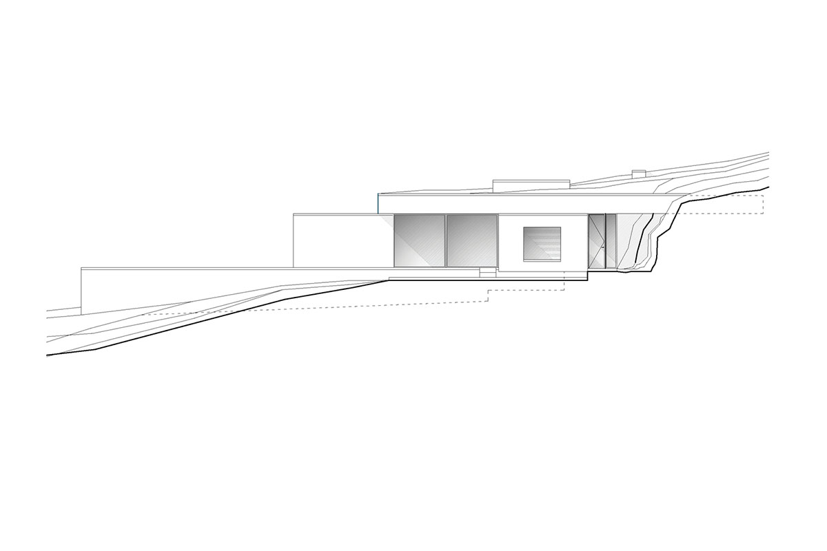 Swimming pool is bravely extended from inside of this concrete house towards endless view in Tinos