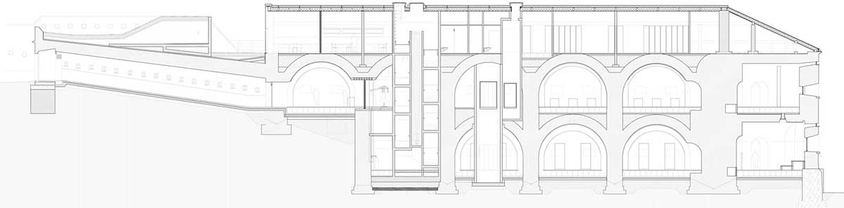 BBGK Architekci designed 12-metre-high stained concrete wall to narrate victims for Katyn Museum