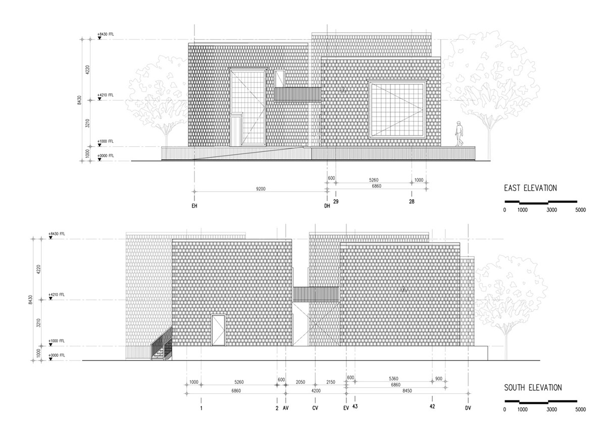 Five glass blocks with framed wood form this woman restaurant designed by Bangkok Project Studio