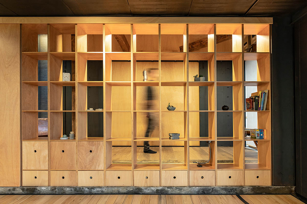 RAMA estudio built glazed retreat that sits on slope with minimal touch overlooking valley in Ecuador