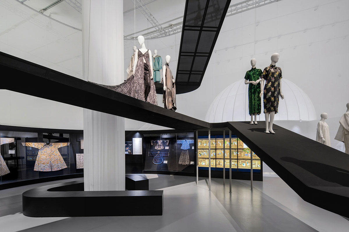 Studio 10 designs exhibition space with white tubular structures and black translucent ramps in China