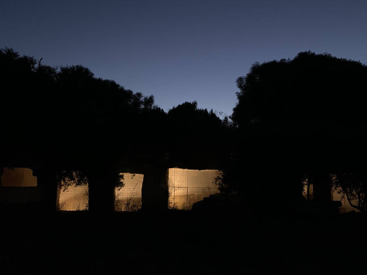 Ensamble Studio carves out former military sandstone quarry to design Ca'n Terra House in Menorca