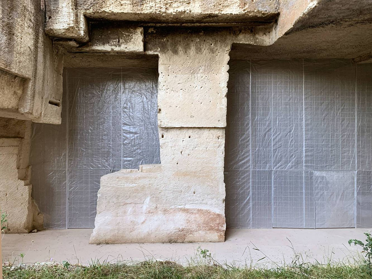 Ensamble Studio carves out former military sandstone quarry to design Ca'n Terra House in Menorca