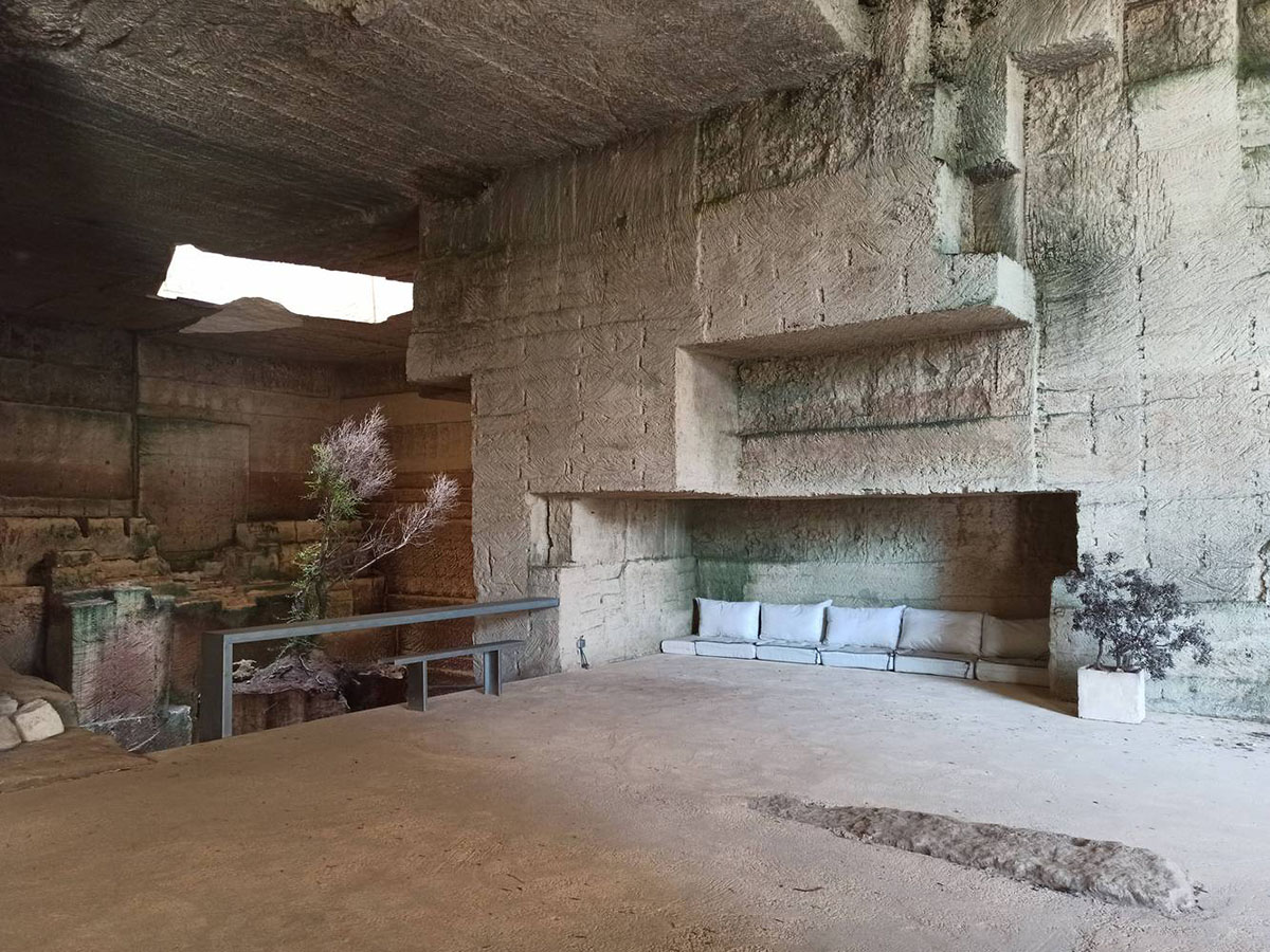 Ensamble Studio carves out former military sandstone quarry to design Ca'n Terra House in Menorca