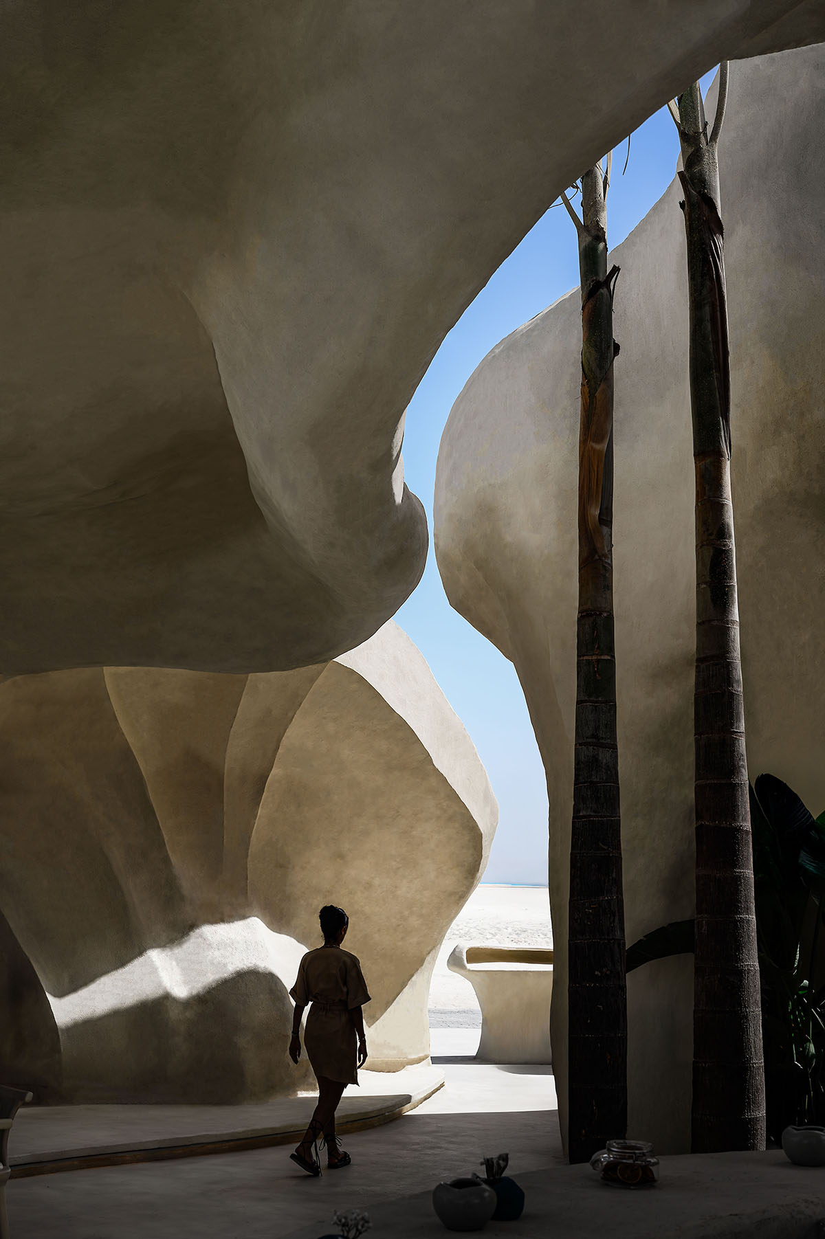 Badie Architects imagines Esca Playa restaurant as a continuous concrete shell in a desert 