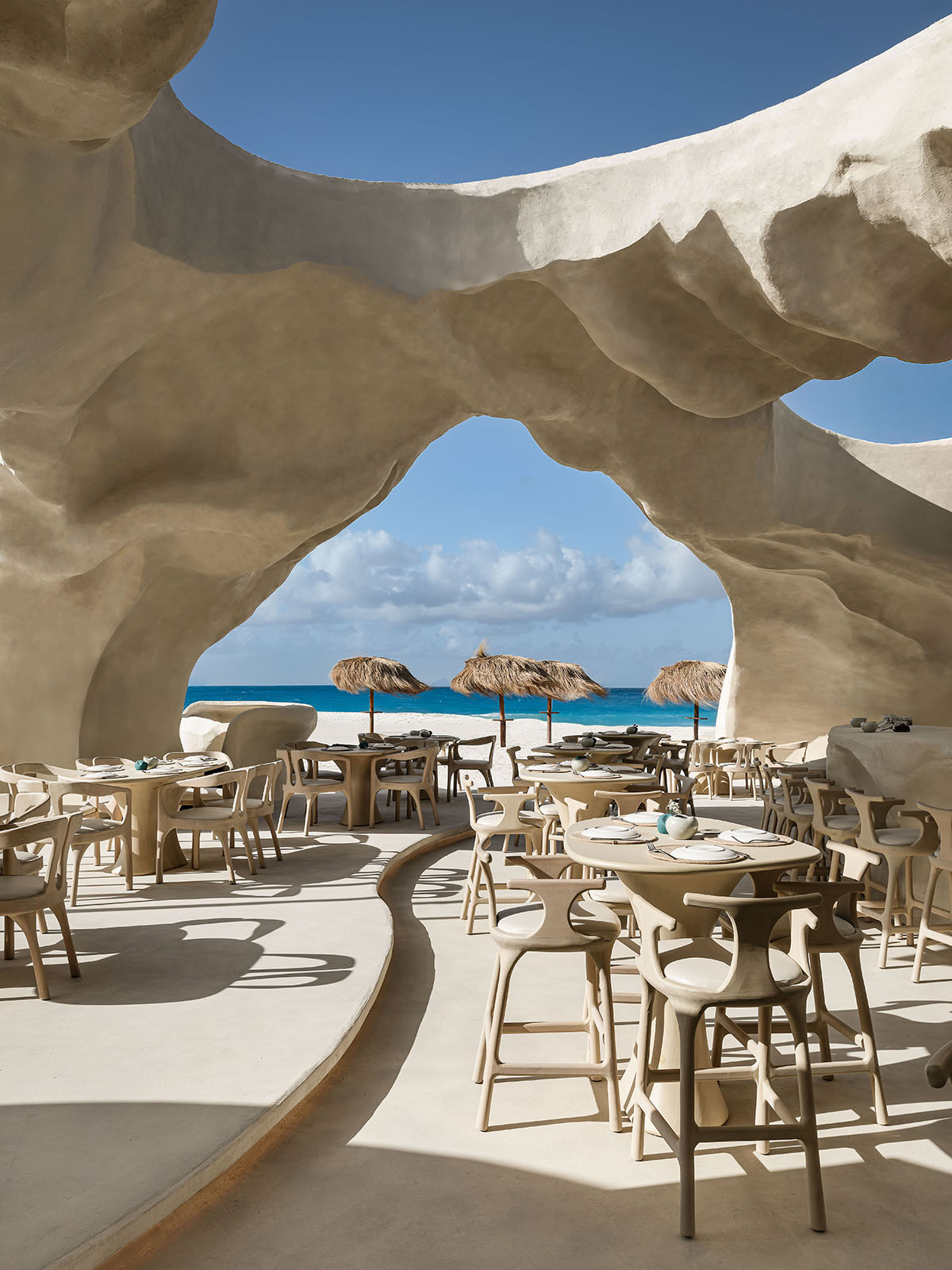 Badie Architects imagines Esca Playa restaurant as a continuous concrete shell in a desert 