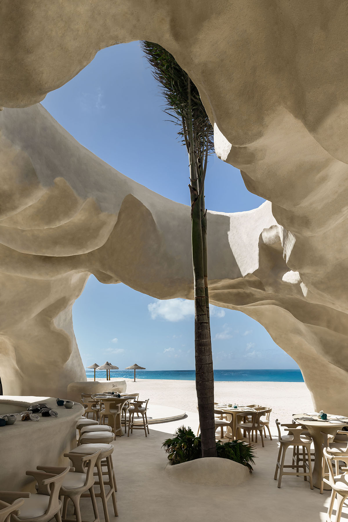 Badie Architects imagines Esca Playa restaurant as a continuous concrete shell in a desert 