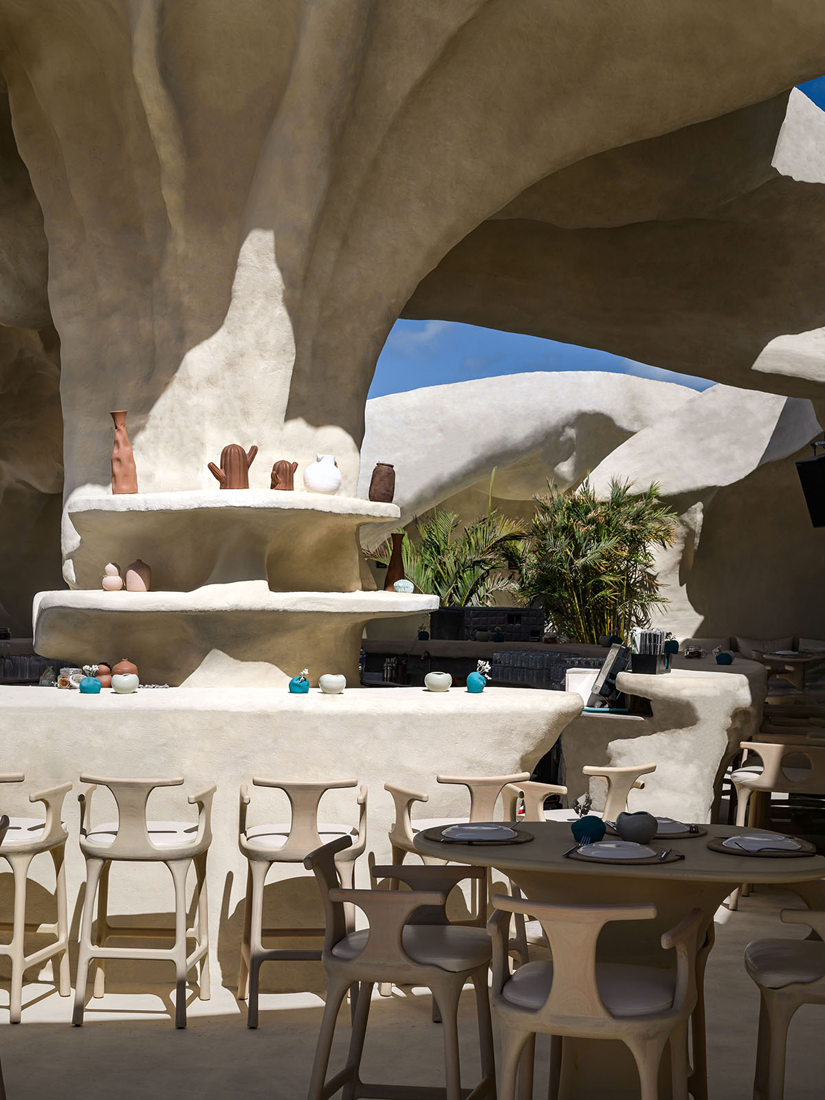 Badie Architects imagines Esca Playa restaurant as a continuous concrete shell in a desert 