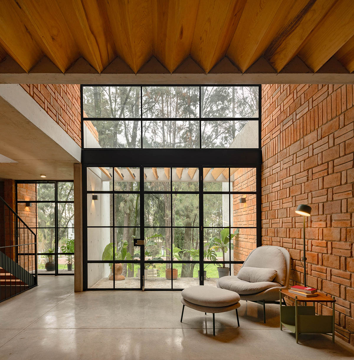 Estudio Tecalli uses red clay brick, concrete and glass to form MoMa House in Mexico