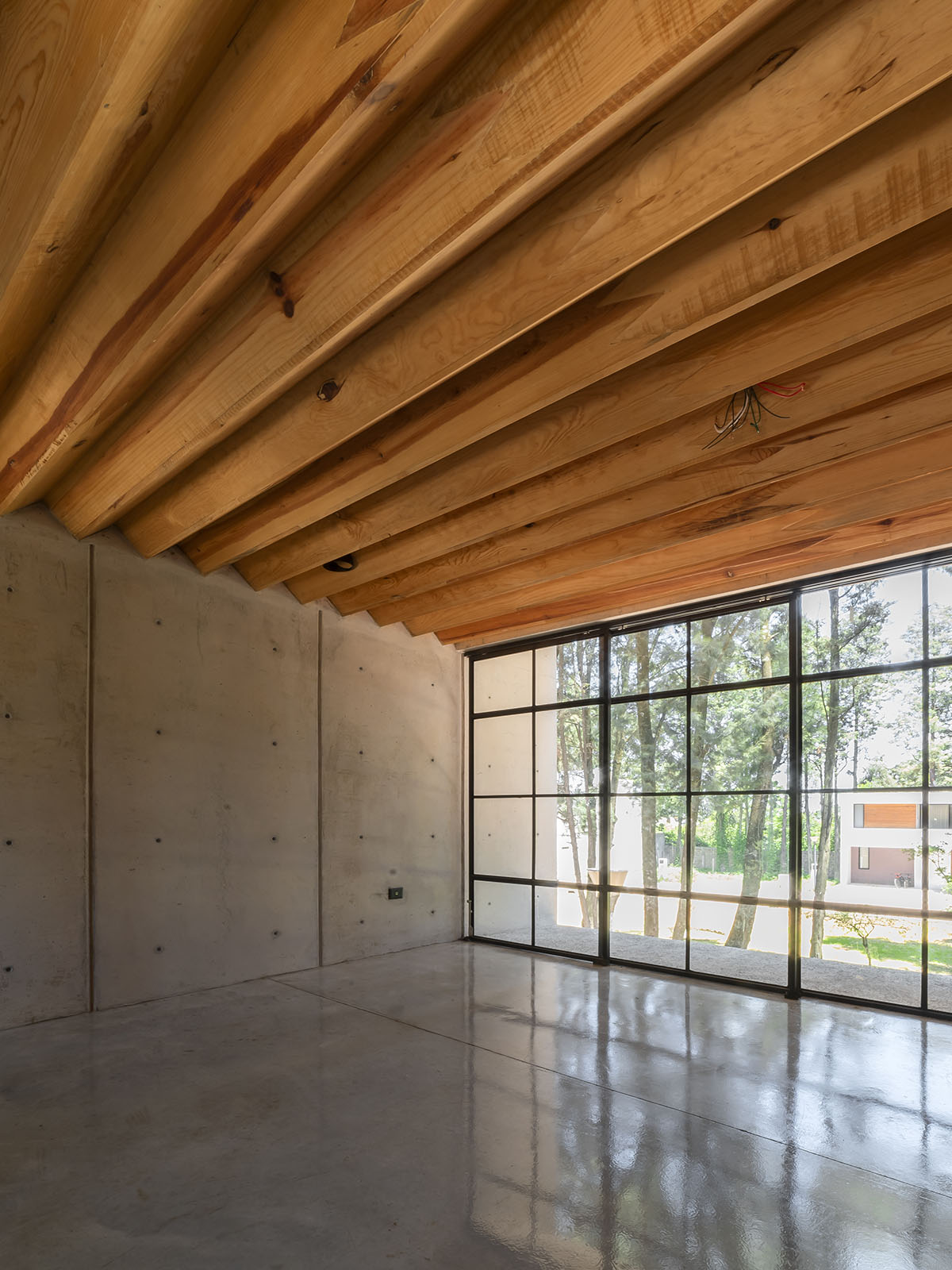Estudio Tecalli uses red clay brick, concrete and glass to form MoMa House in Mexico