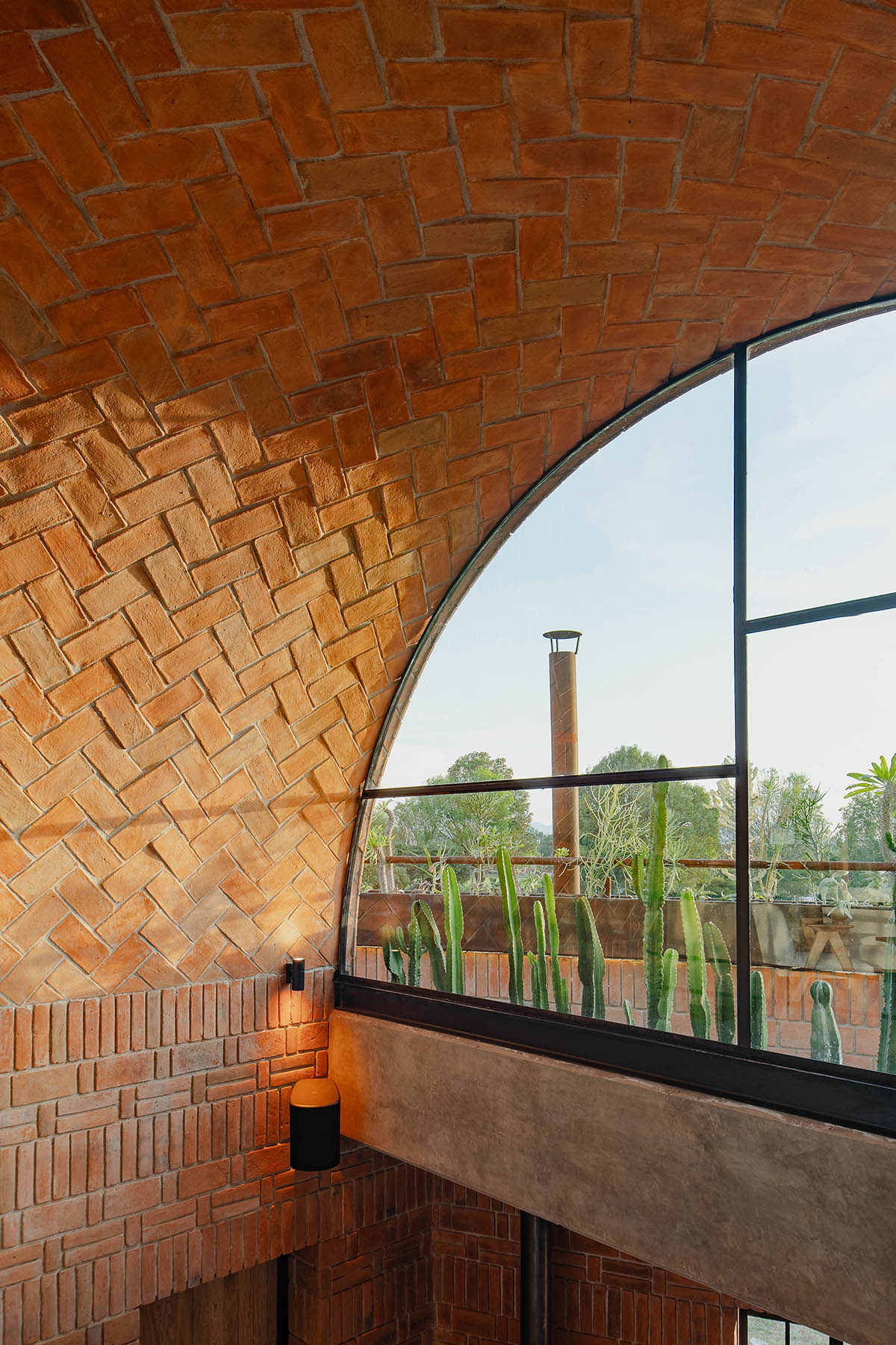 Estudio Tecalli built bar with red brick vault in Mexico