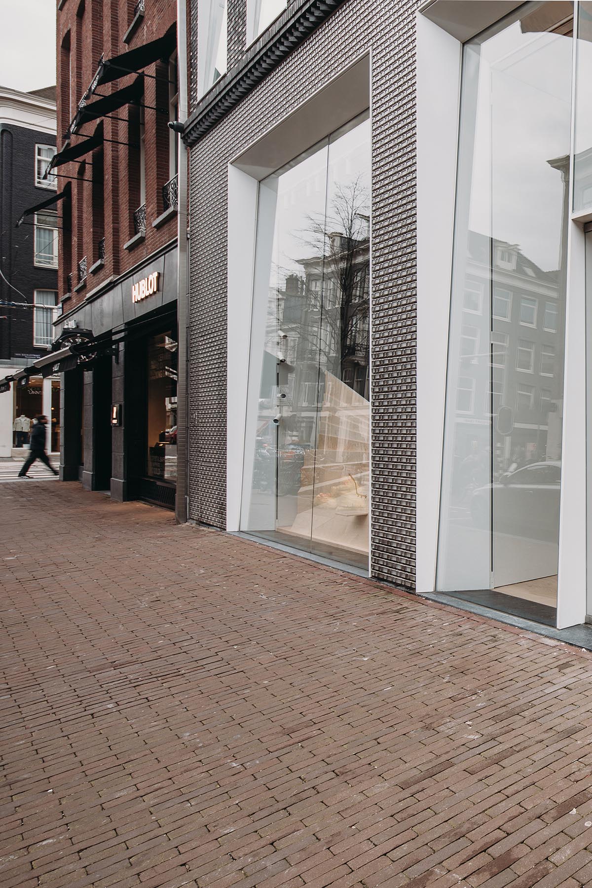 UNStudio creates brick textured facade for a retail store in Amsterdam