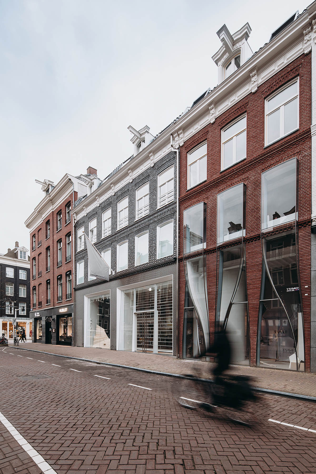 UNStudio creates brick textured facade for a retail store in Amsterdam