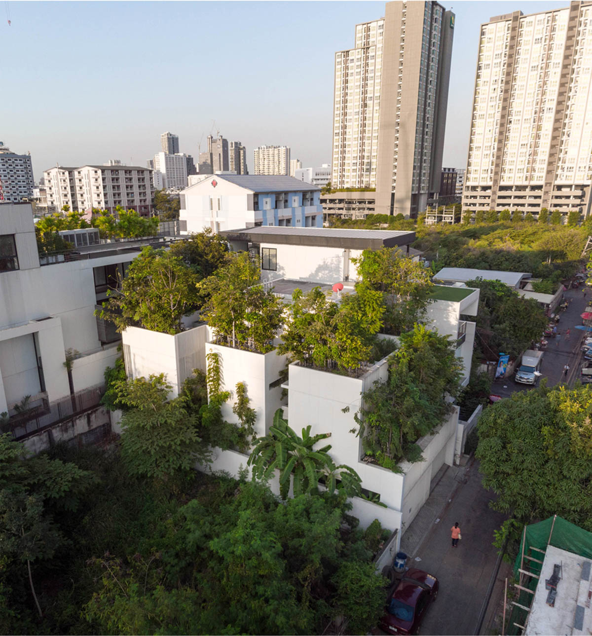 Shma Company Limited built residence that features bulging mini forest from its facade in Thailand