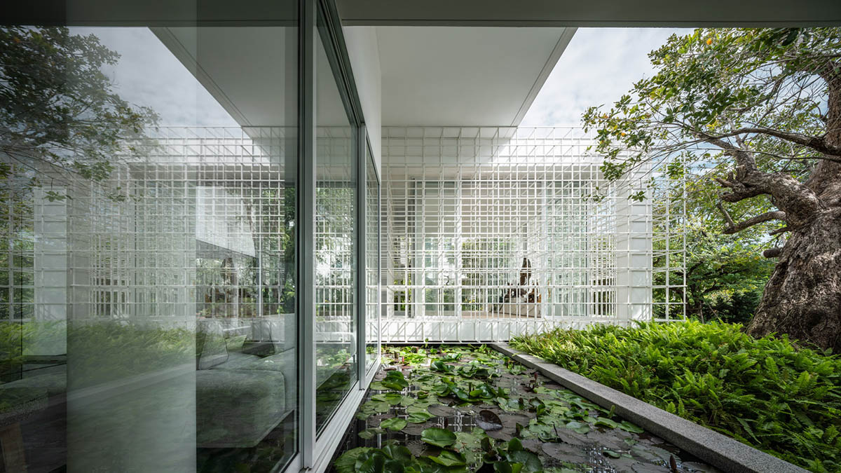 AAd built self-sustainable residence with perforated facade and steel rods in Thailand