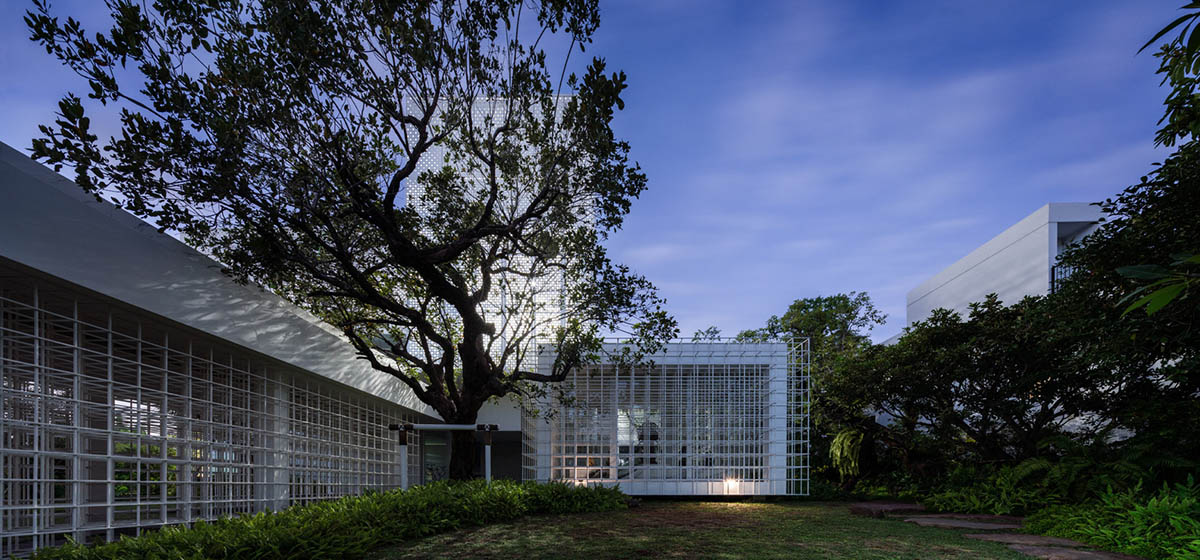 AAd built self-sustainable residence with perforated facade and steel rods in Thailand