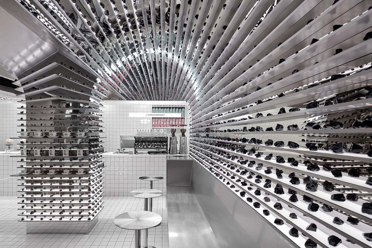 Linehouse forms interiors evoking a sense of being in a spaceship for a pastry store in Shanghai  