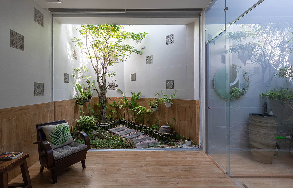 CoCo House, inspired by animated film, is clad in glass brick façade with wavy patterns in Vietnam