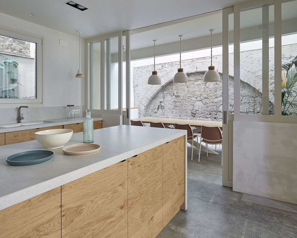 Cosybarcelona converts former cereal factory into a double-height yoga studio in Barcelona 