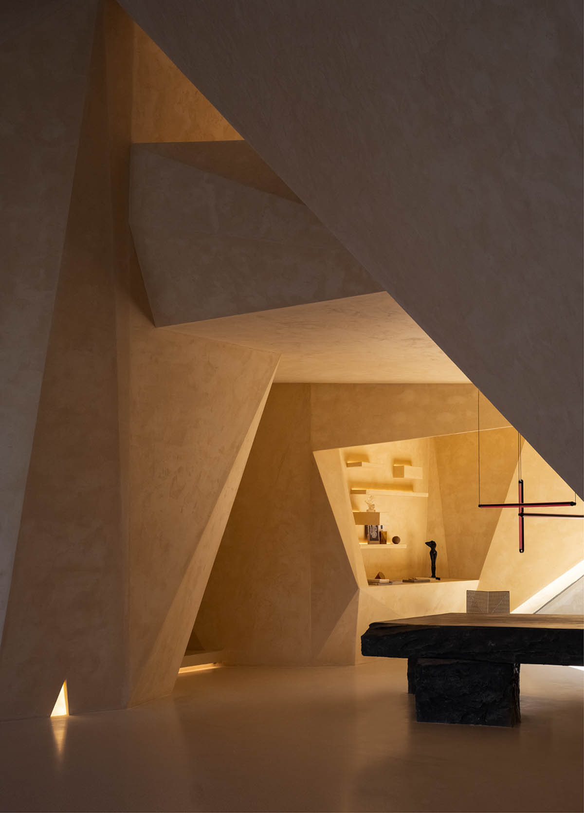 Eyewear showroom features folded surfaces blending with soft light in Zhejiang, China