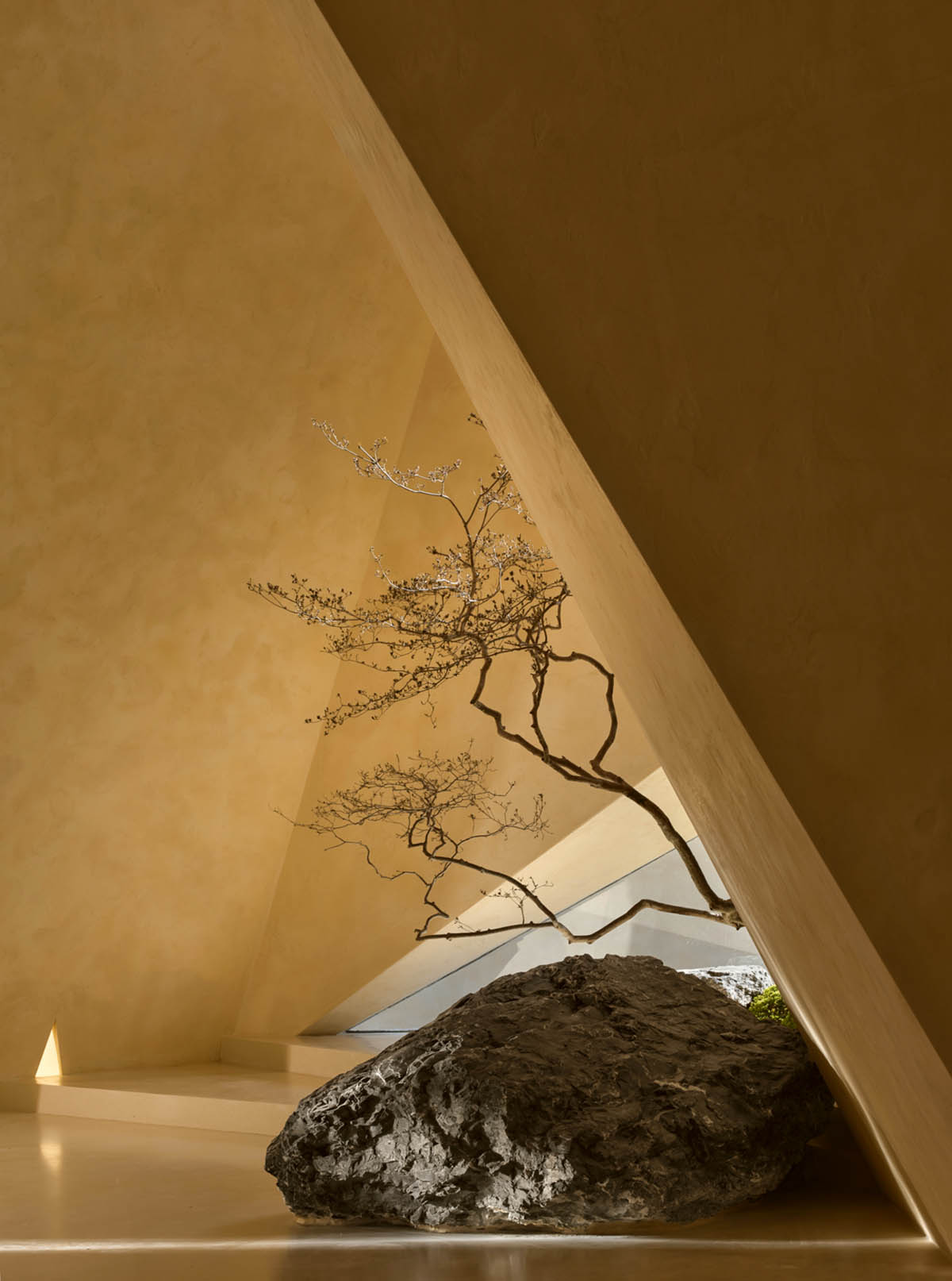 Eyewear showroom features folded surfaces blending with soft light in Zhejiang, China