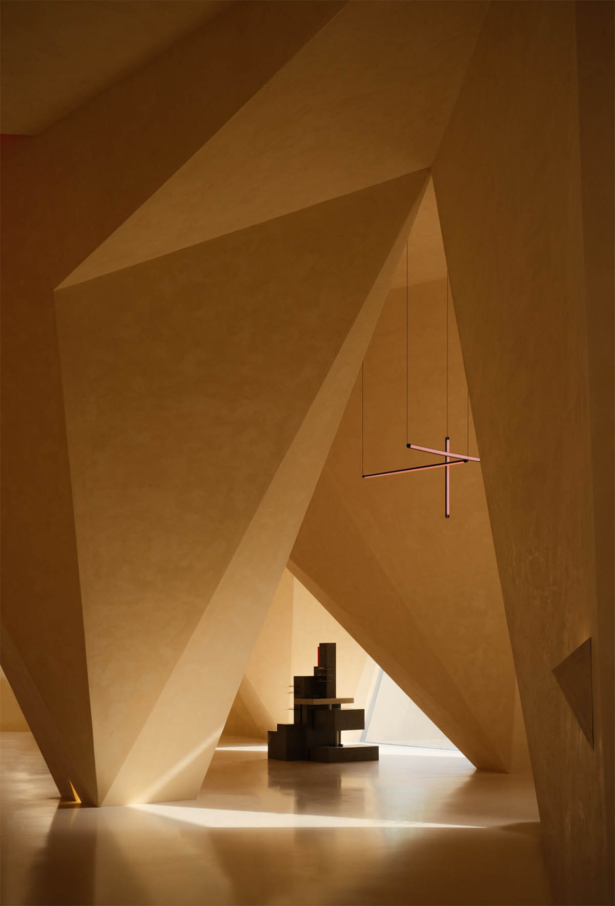 Eyewear showroom features folded surfaces blending with soft light in Zhejiang, China