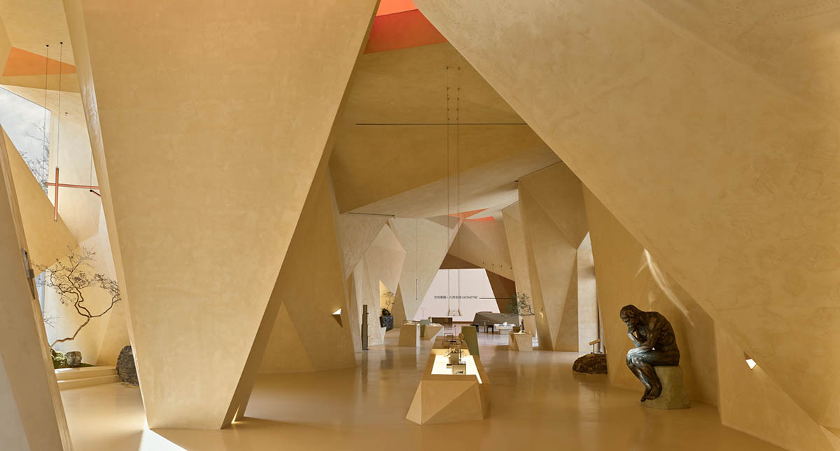 Eyewear showroom features folded surfaces blending with soft light in Zhejiang, China