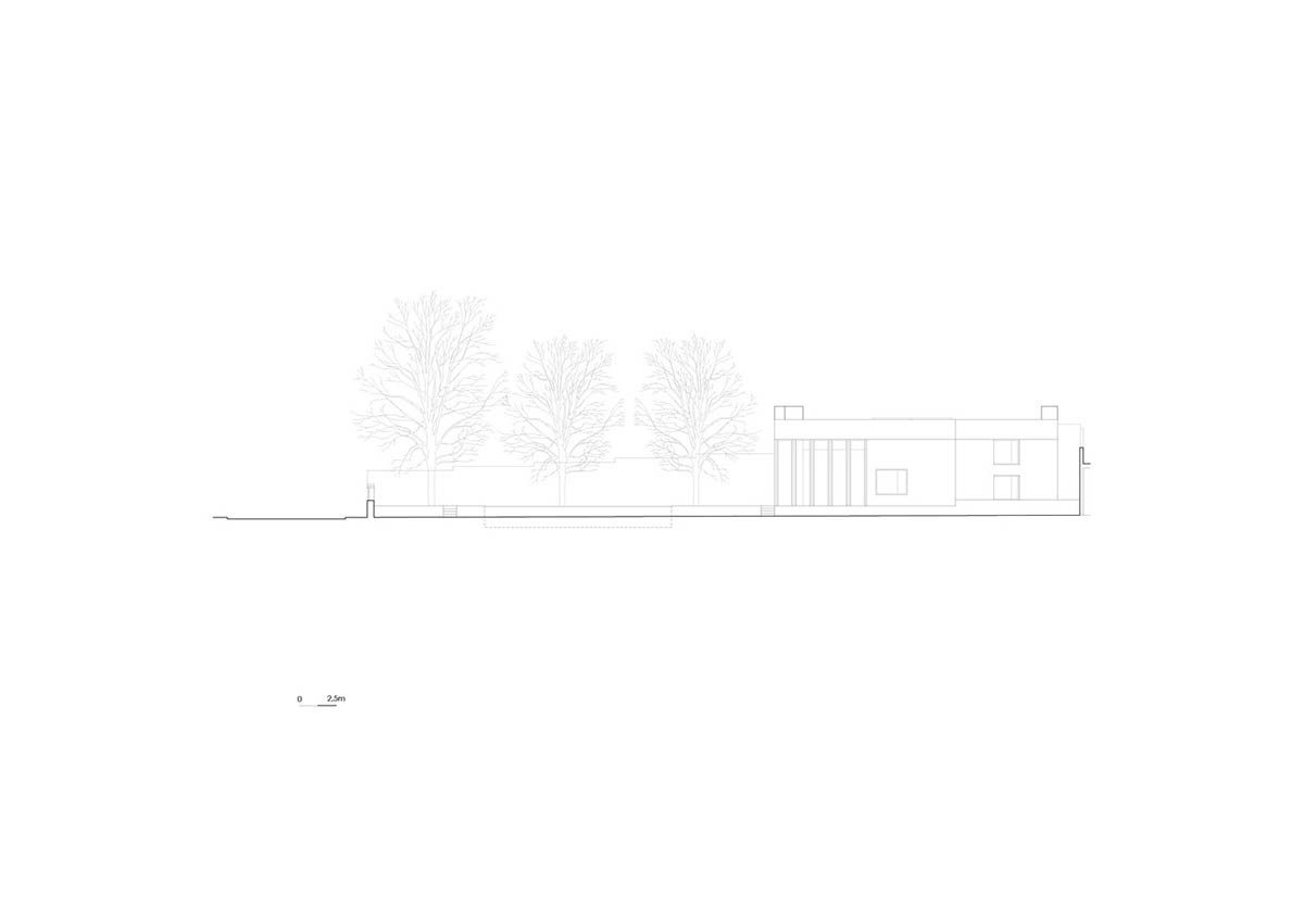 House 2 is a pigmented concrete addition with light-filled winter garden to existing house in Porto