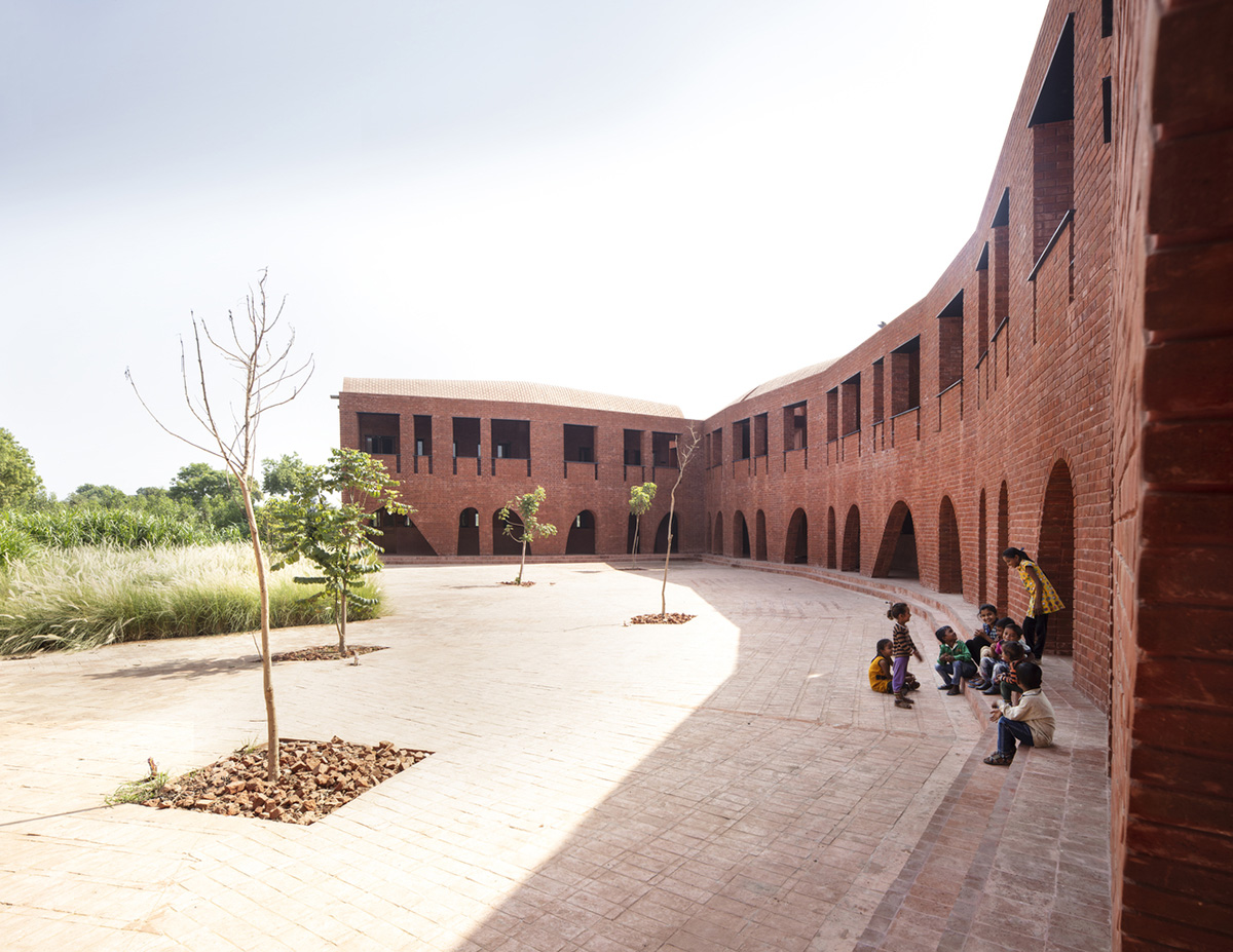 A school built from tilted brick vaults evoke a child's freedom in India