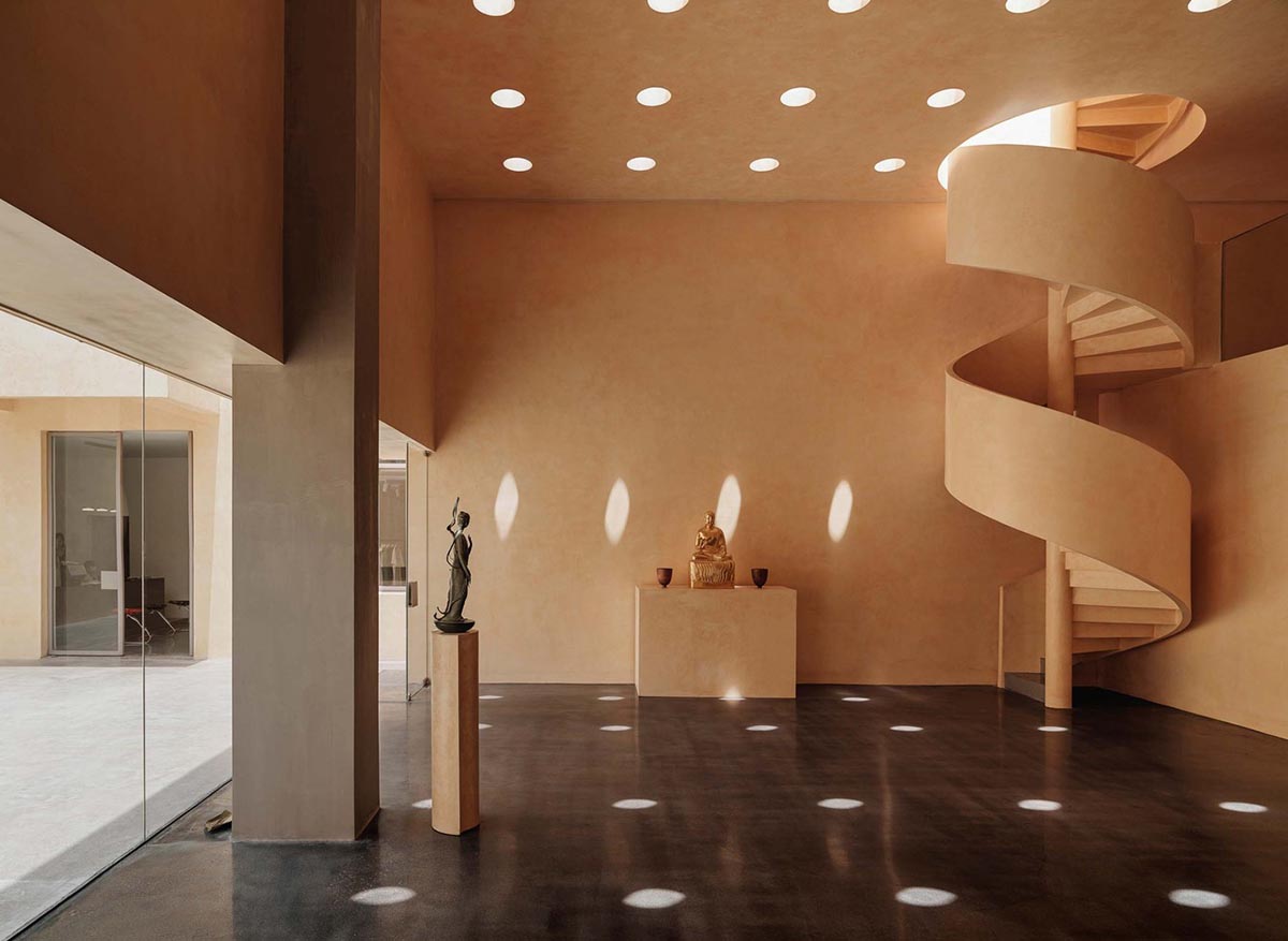 Ladder-Like sandalwood yellow volumes form Buddha artist's exhibition space and studio in China