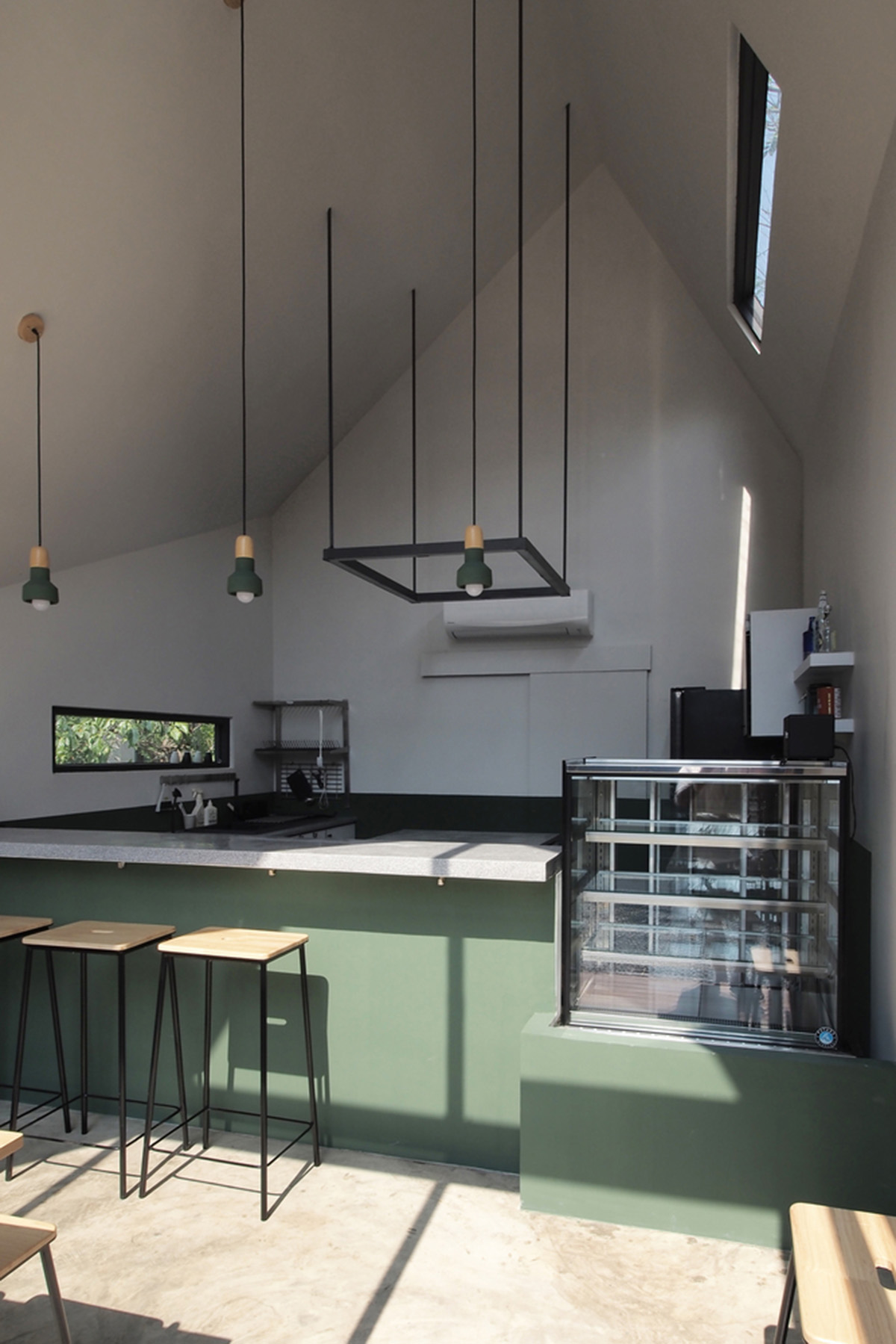 ASWA designs small cafe in Bangkok with a metaphor roof inspired by chocolate cream