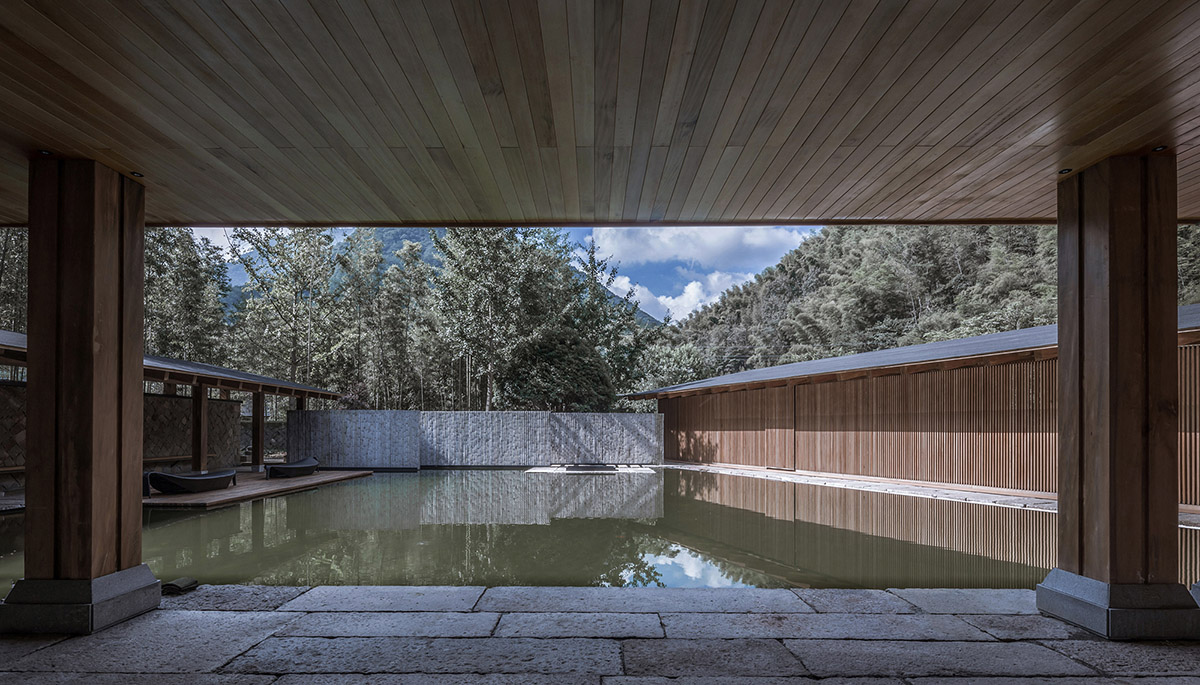 Continuation Studio converts old farmhouse into a boutique hotel dressed with ancient wood