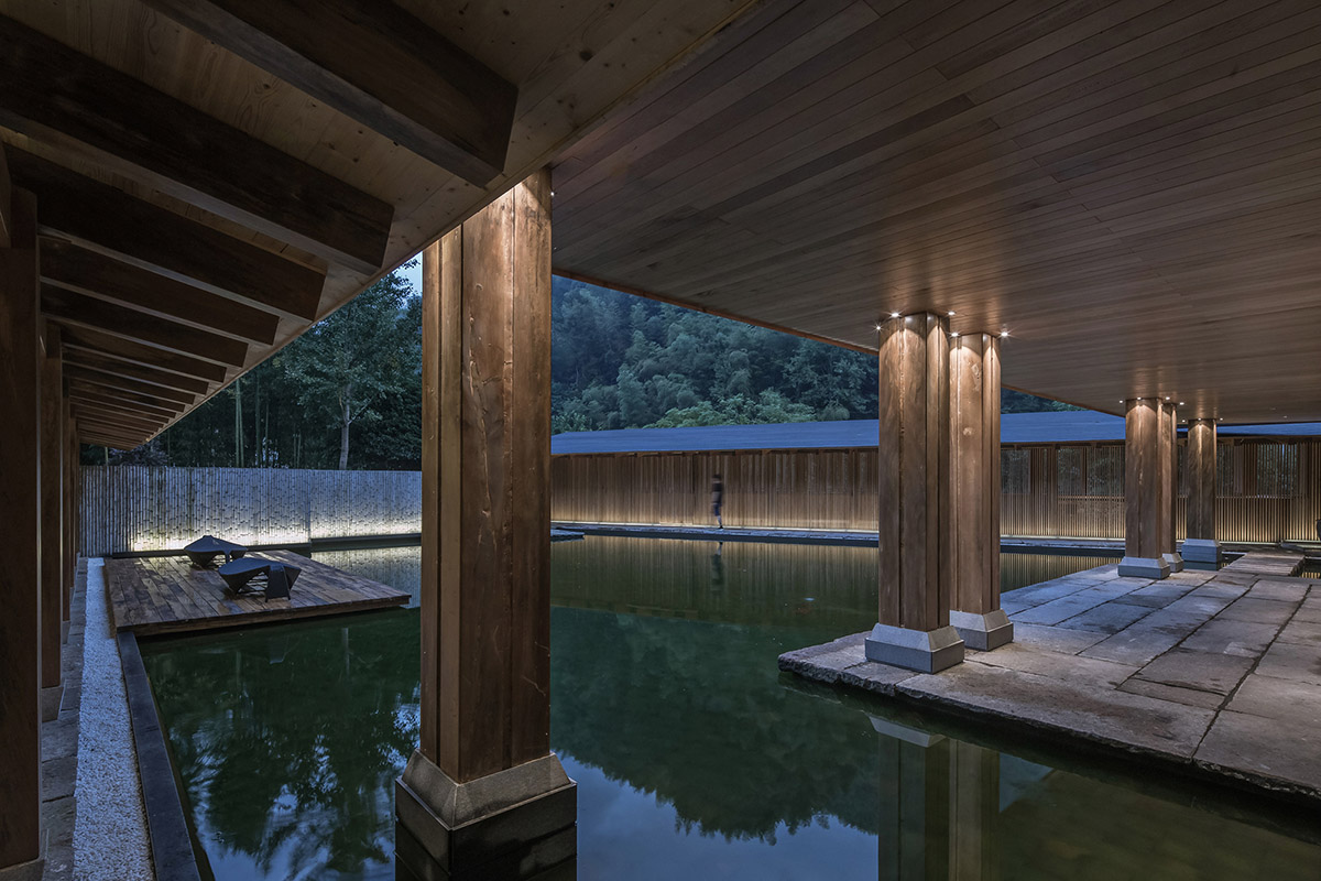 Continuation Studio converts old farmhouse into a boutique hotel dressed with ancient wood