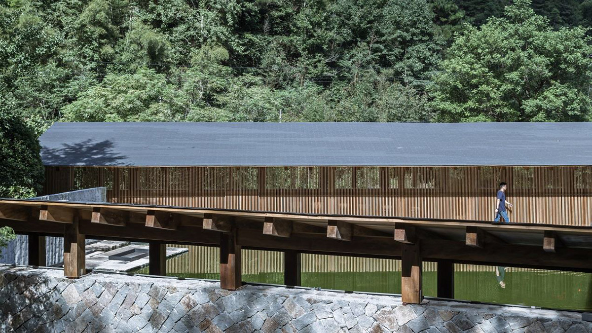 Continuation Studio converts old farmhouse into a boutique hotel dressed with ancient wood