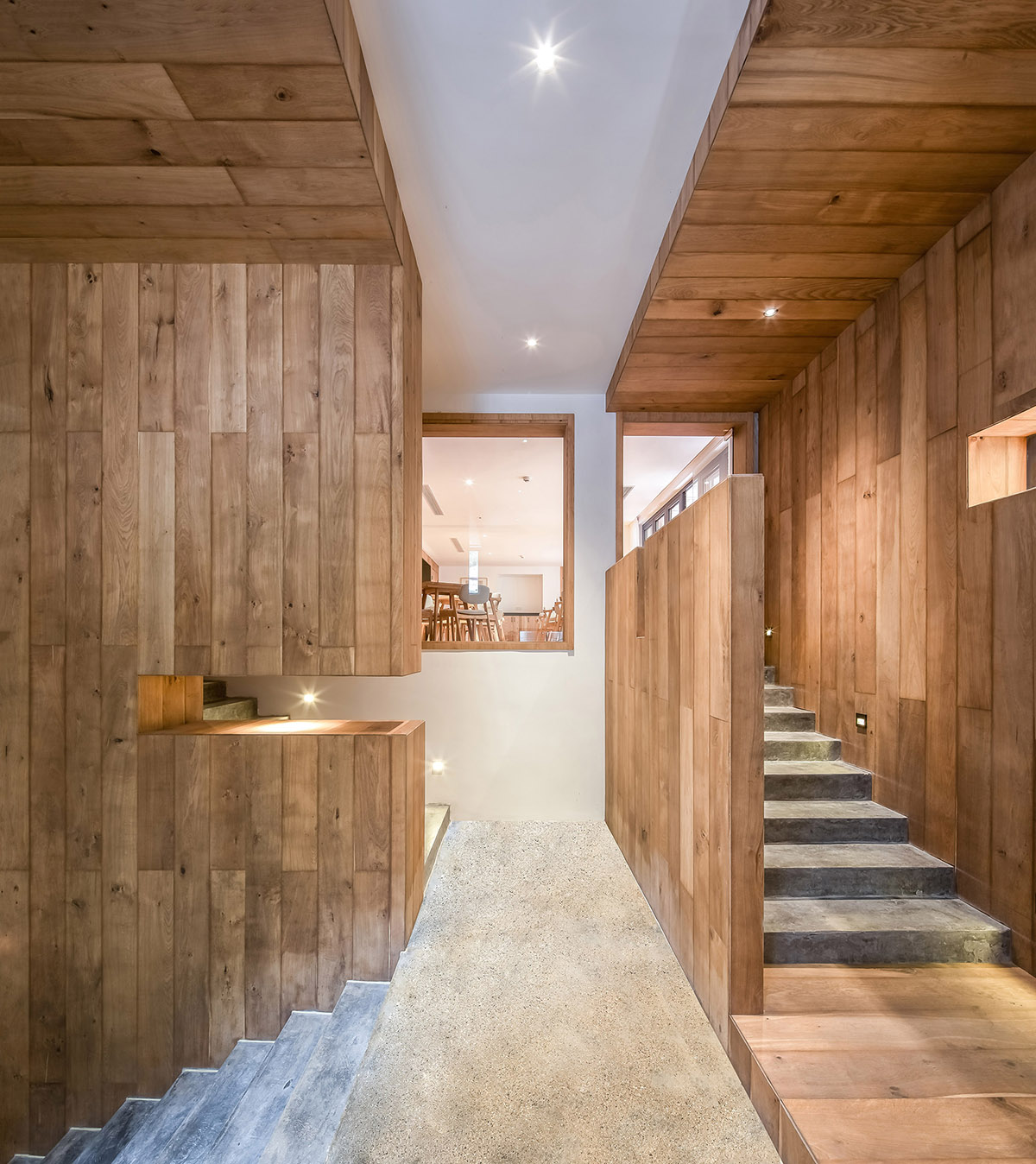 Continuation Studio converts old farmhouse into a boutique hotel dressed with ancient wood