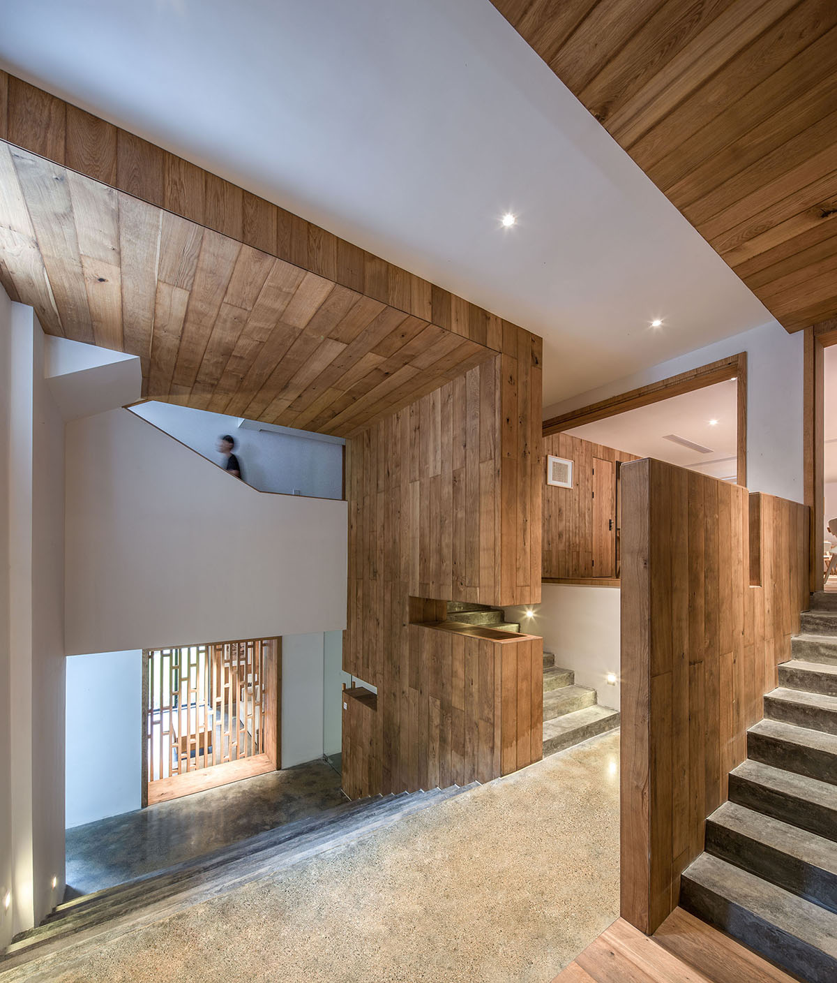 Continuation Studio converts old farmhouse into a boutique hotel dressed with ancient wood