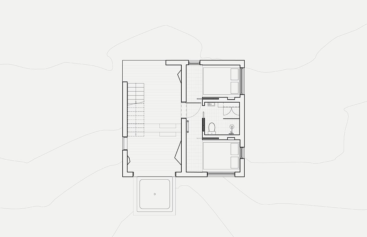Quinzhee Architecture imagines a rustic retreat like a climbing block in Canada