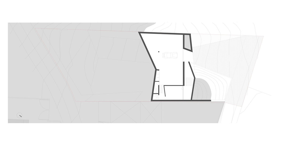 Contaminar Arquitectos built cave-like house from irregular walls inspired by rocky topography