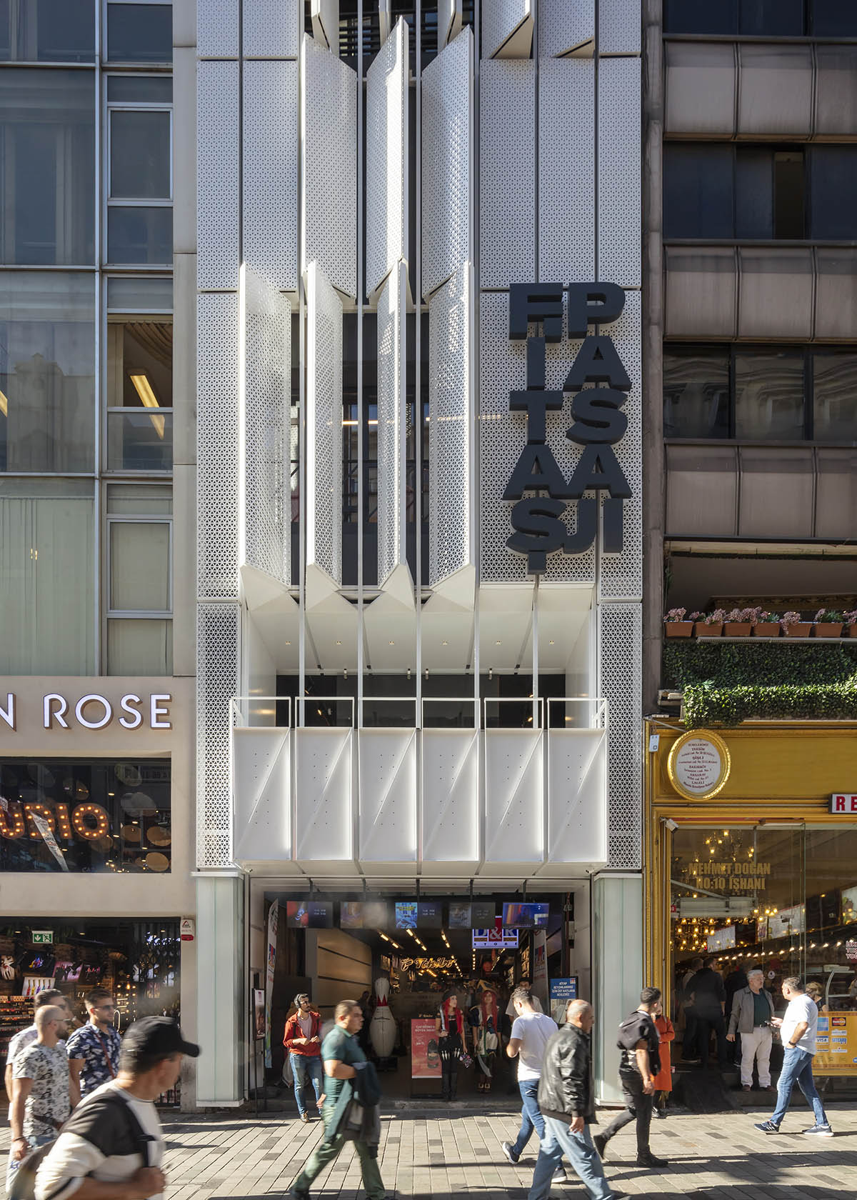 Salon Alper Derinbogaz renovates historic arcade passage with angular perforated panels in Istanbul