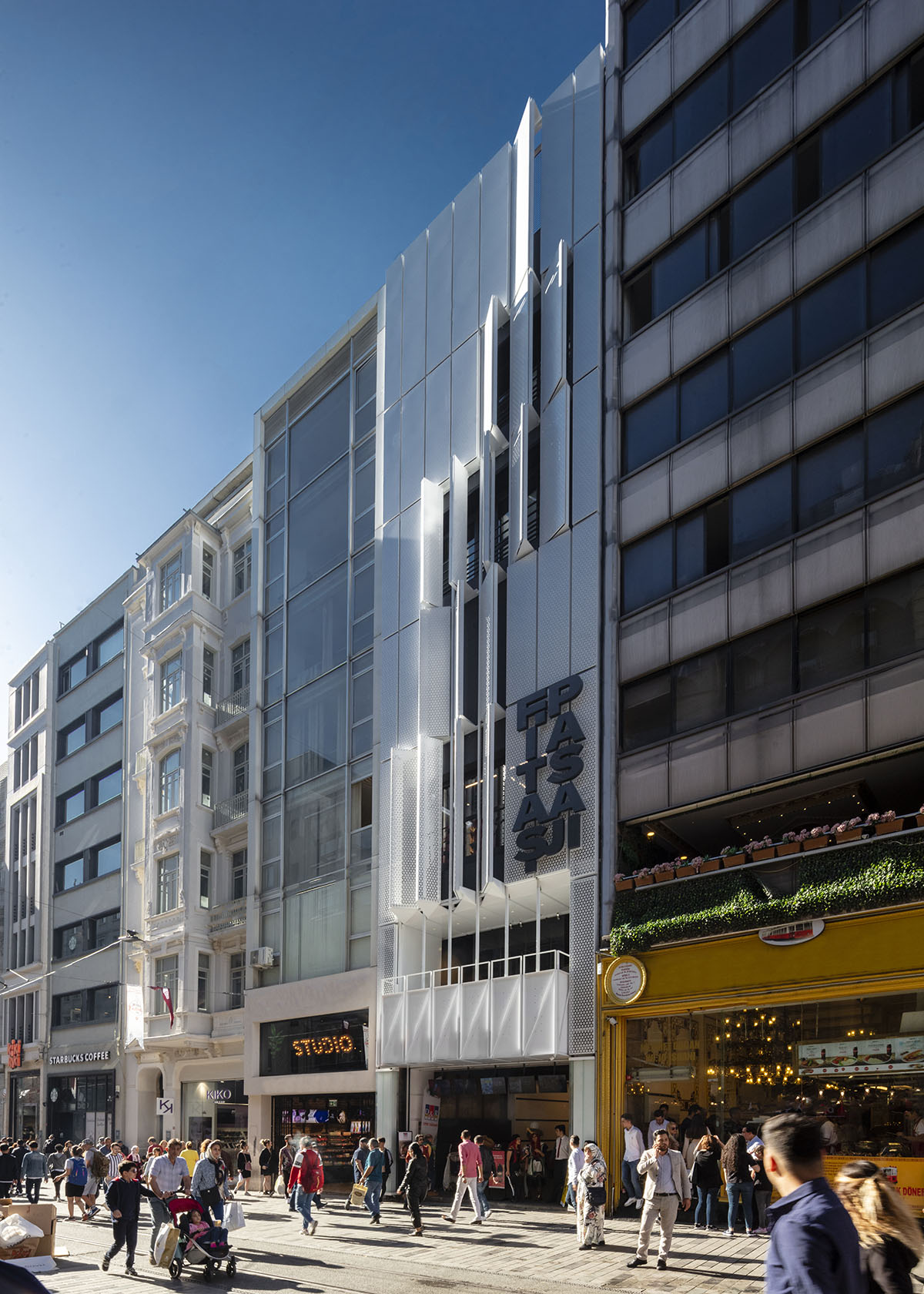 Salon Alper Derinbogaz renovates historic arcade passage with angular perforated panels in Istanbul