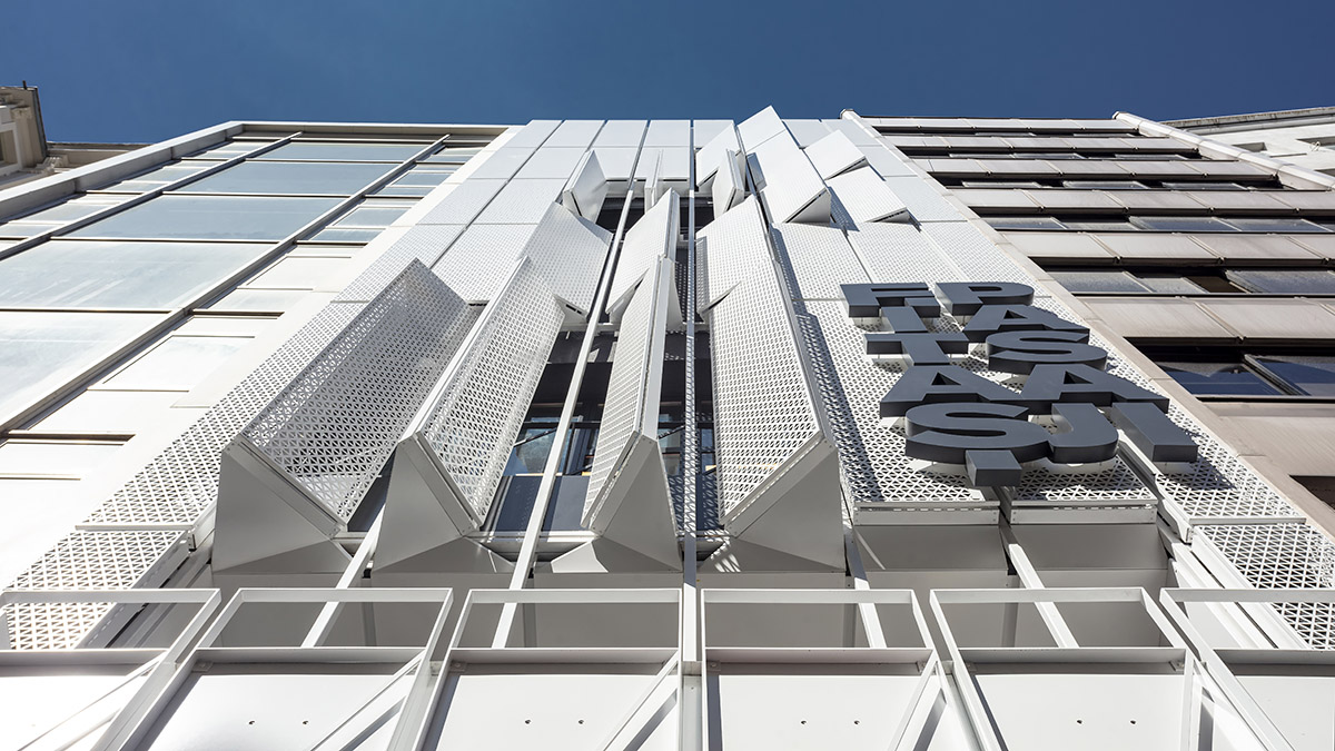 Salon Alper Derinbogaz renovates historic arcade passage with angular perforated panels in Istanbul