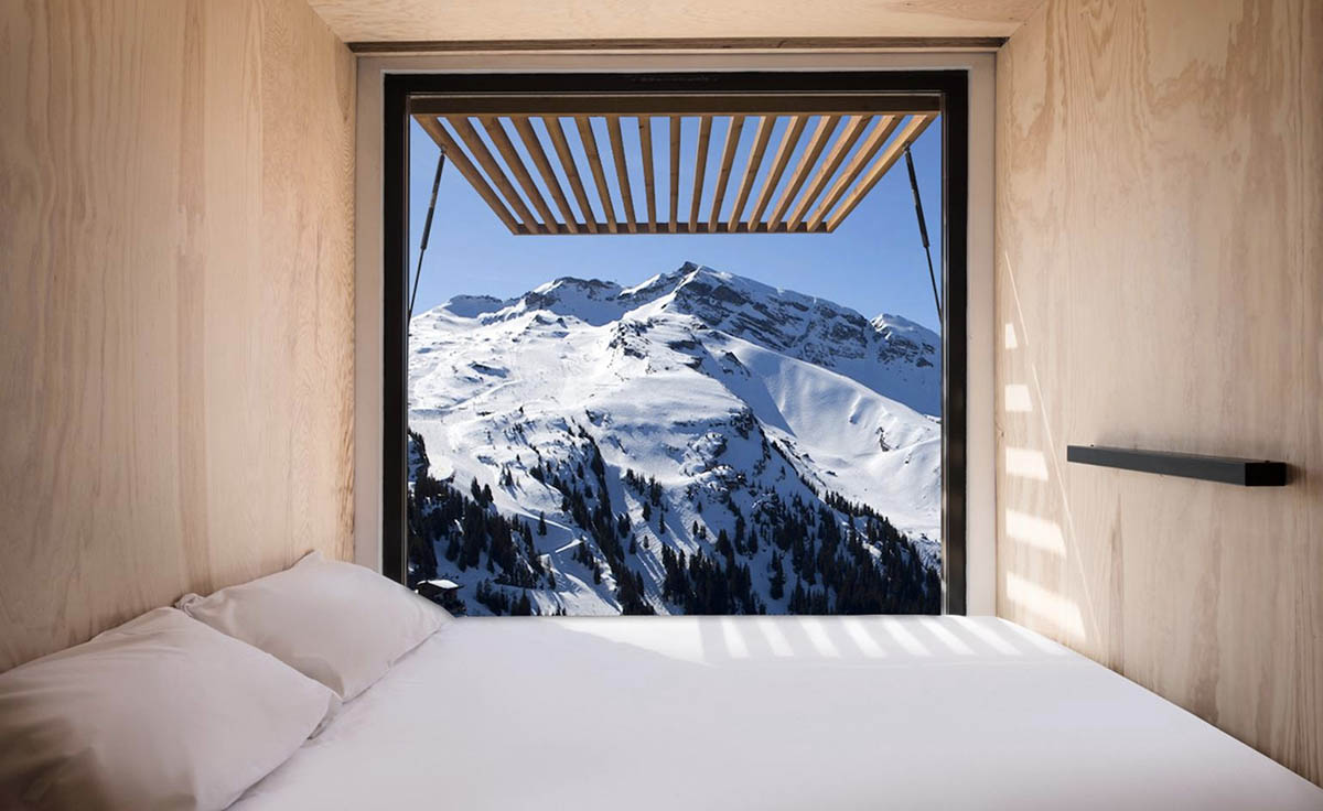 Real wooden shipping containers provide nomadic accommodation designed by Ora Ito