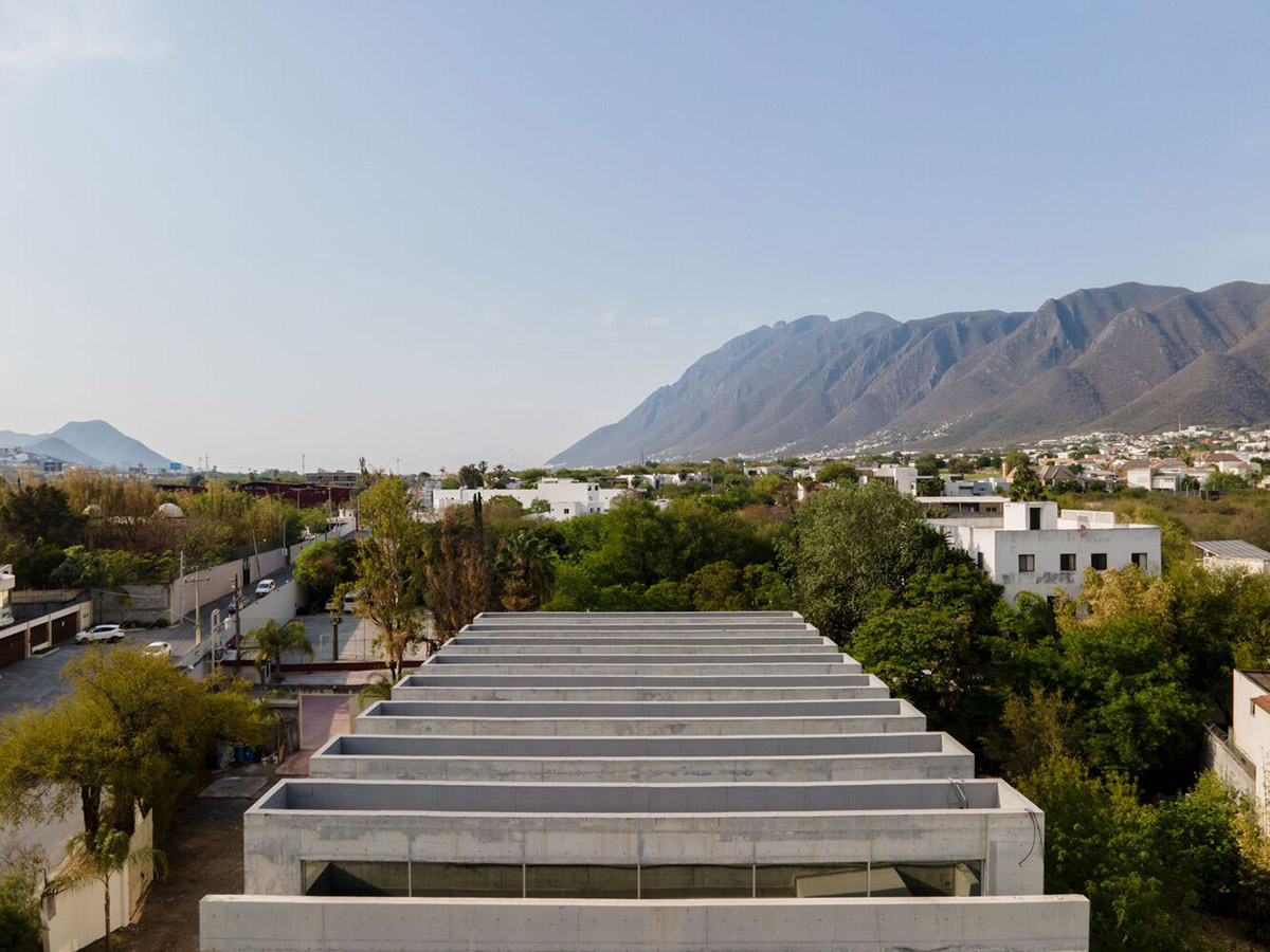 Sliced concrete walls create rhythm and allow abundant natural light for chapel in Monterrey