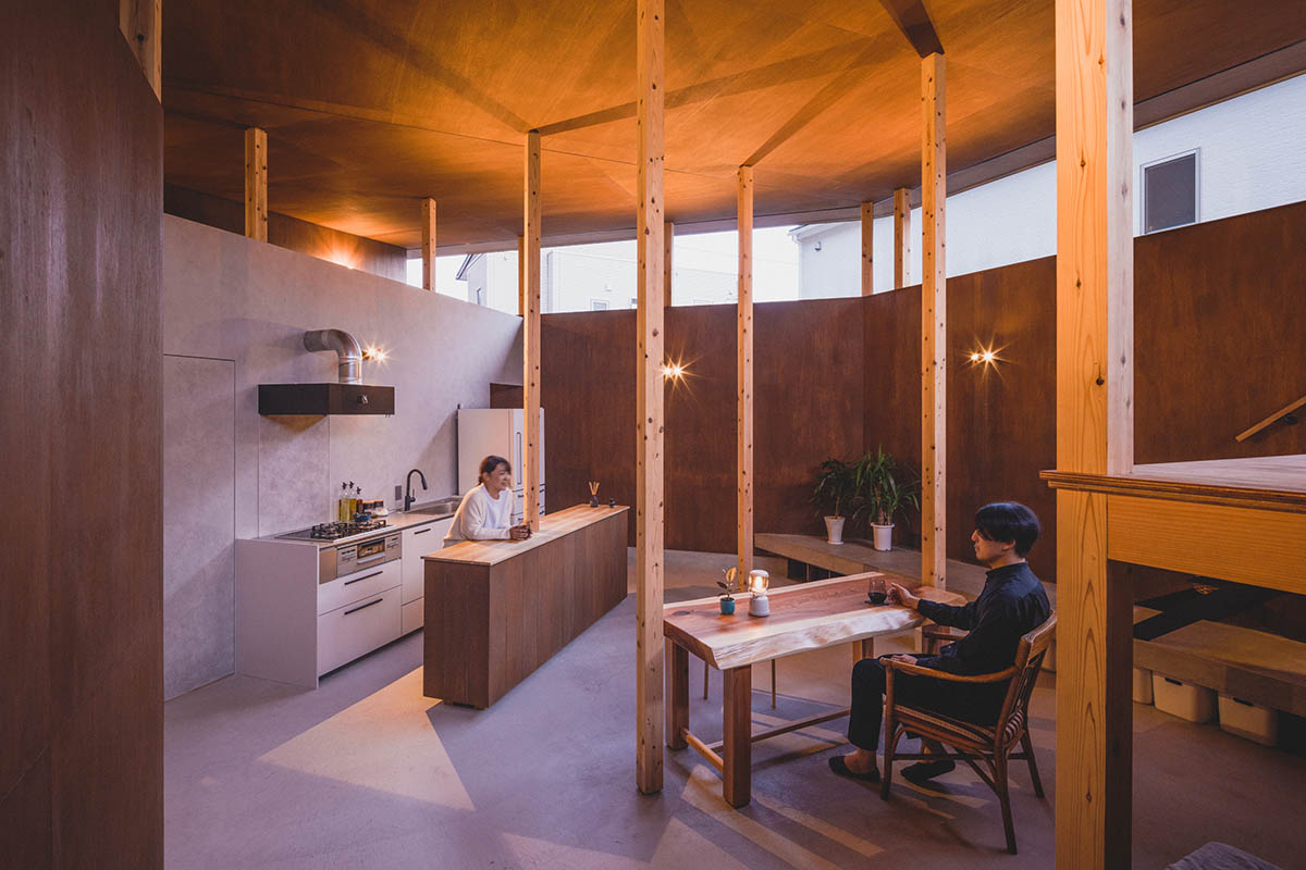 IGArchitects creates two-family house around a forest of wooden pillars in Japan 
