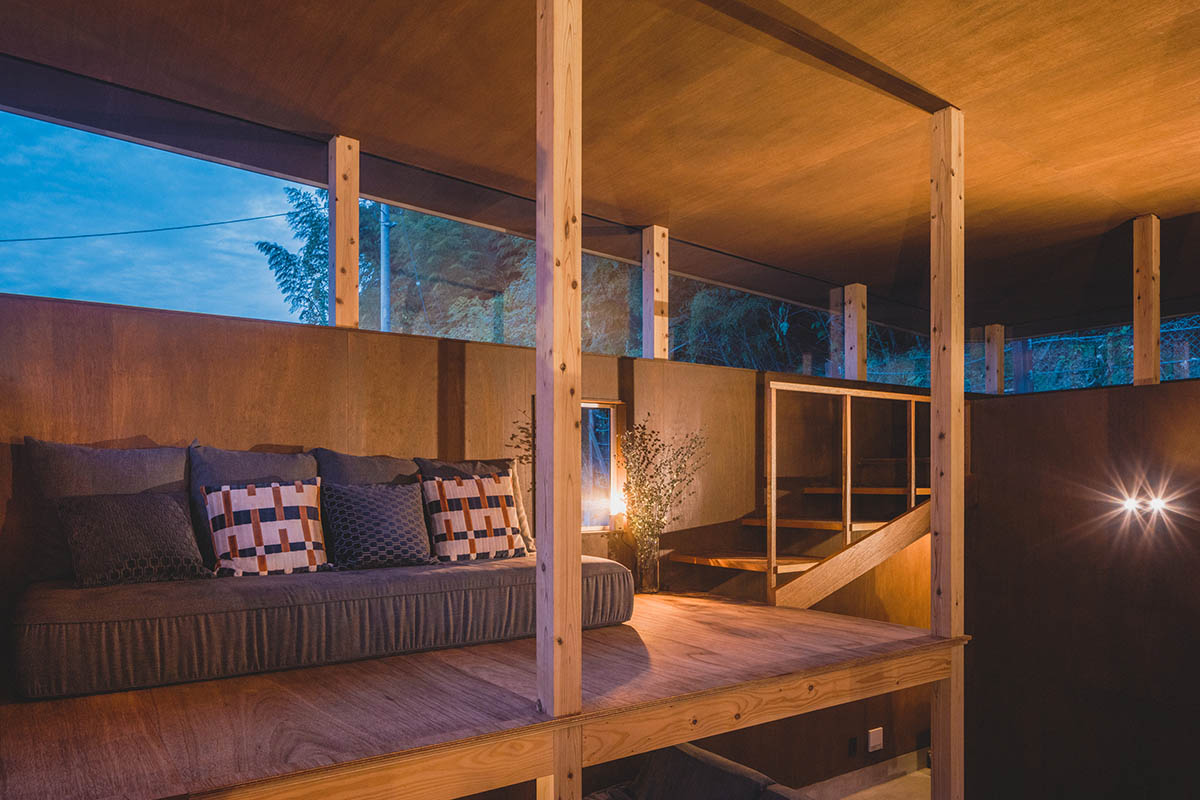 IGArchitects creates two-family house around a forest of wooden pillars in Japan 