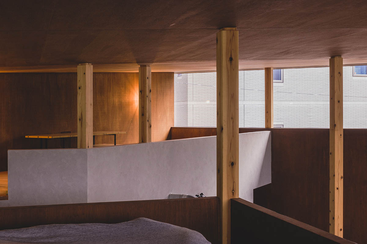 IGArchitects creates two-family house around a forest of wooden pillars in Japan 