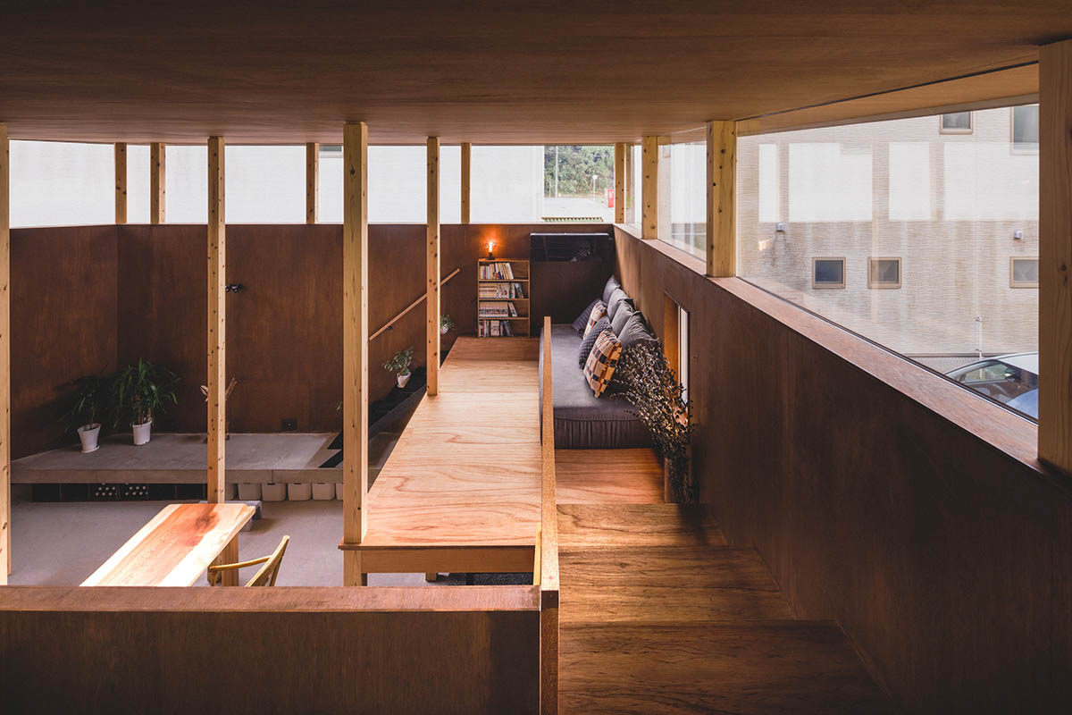 IGArchitects creates two-family house around a forest of wooden pillars in Japan 