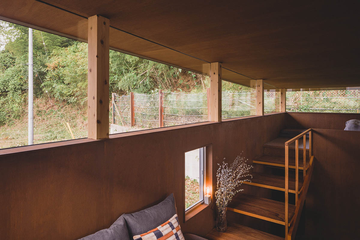 IGArchitects creates two-family house around a forest of wooden pillars in Japan 